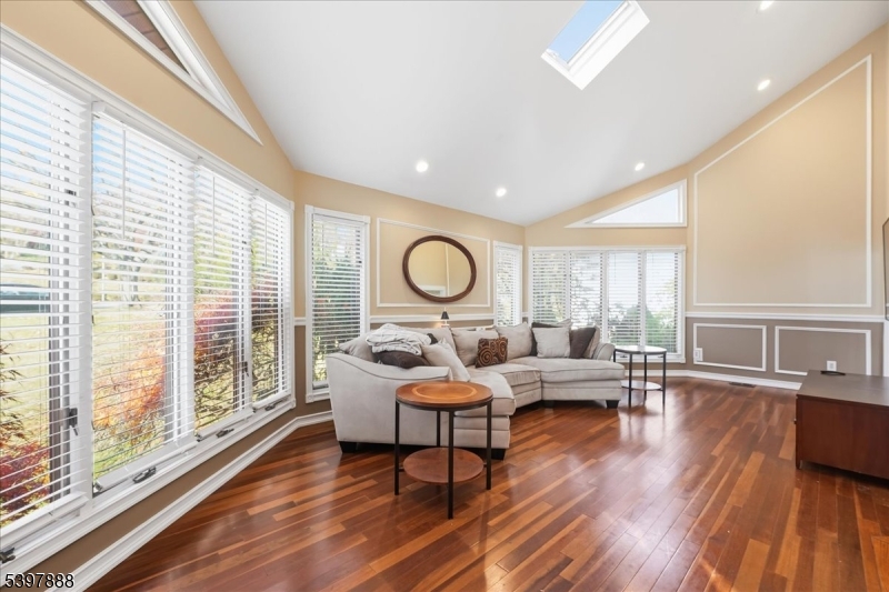 1605 Justin Place, Unit 1 Mountainside, NJ 07092 - Photo 22 of 43 a living room with furniture and a large window