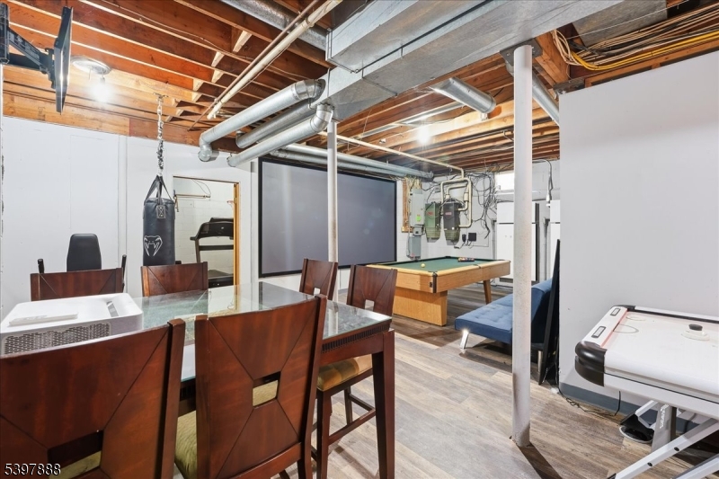 1605 Justin Place, Unit 1 Mountainside, NJ 07092 - Photo 41 of 43 a outdoor dining space with furniture and a kitchen view