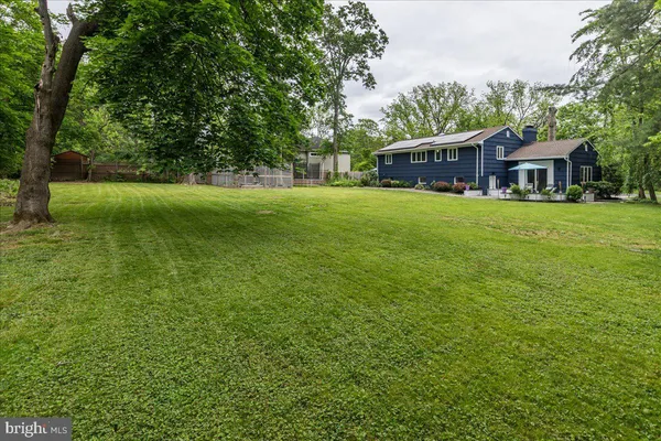 a view of a house with a big yard