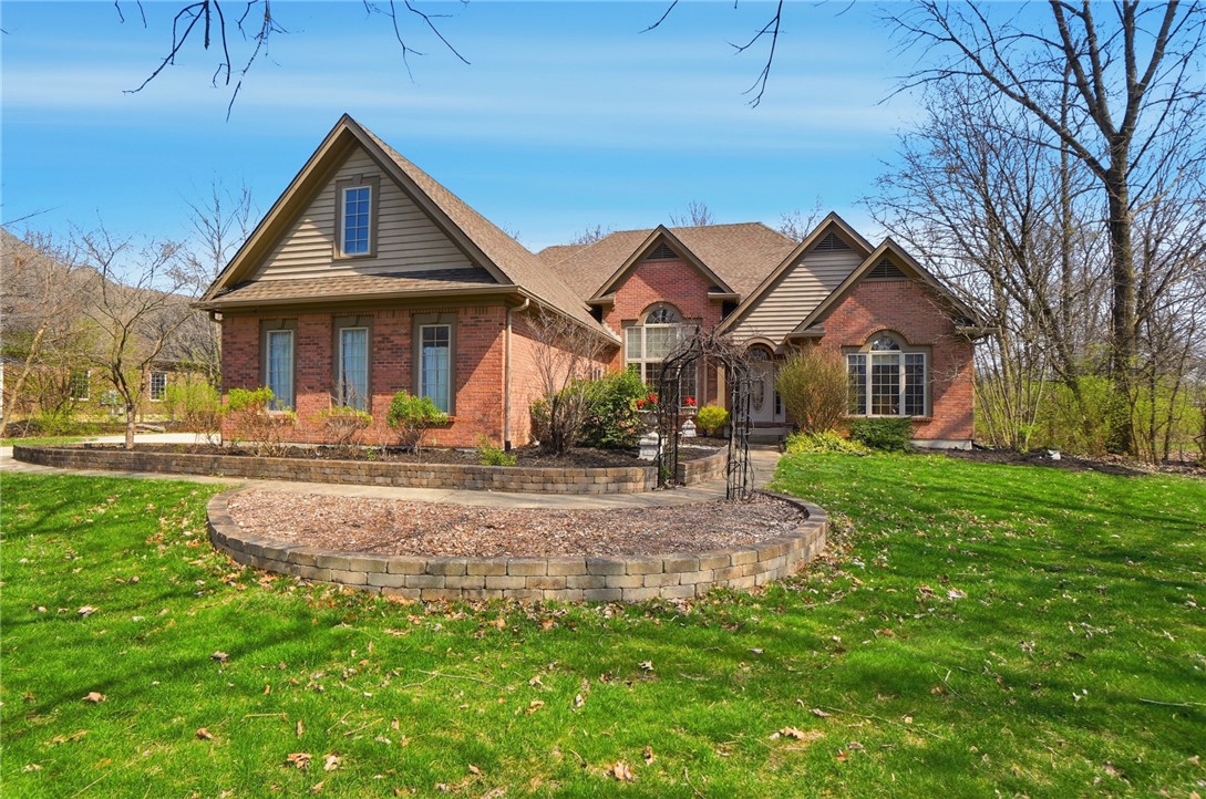 472 Timber Walk Court Springboro, OH 45066 - Photo 54 of 86 This classic brick residence boasts a neatly manicured lawn and mature landscaping.