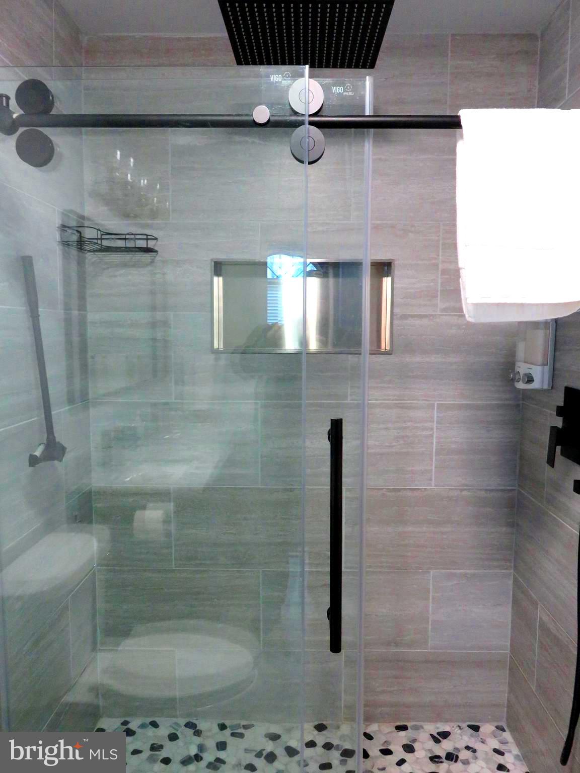 28 Bryan Drive Rehoboth Beach, DE 19971 - Photo 22 of 41 a bathroom with a shower