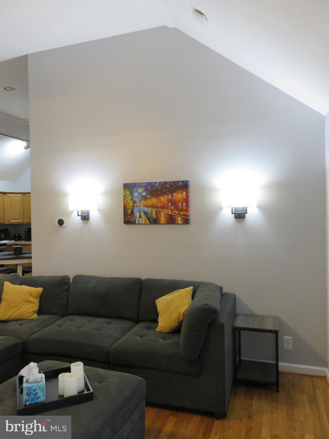 28 Bryan Drive Rehoboth Beach, DE 19971 - Photo 7 of 41 a living room with furniture and a flat screen tv