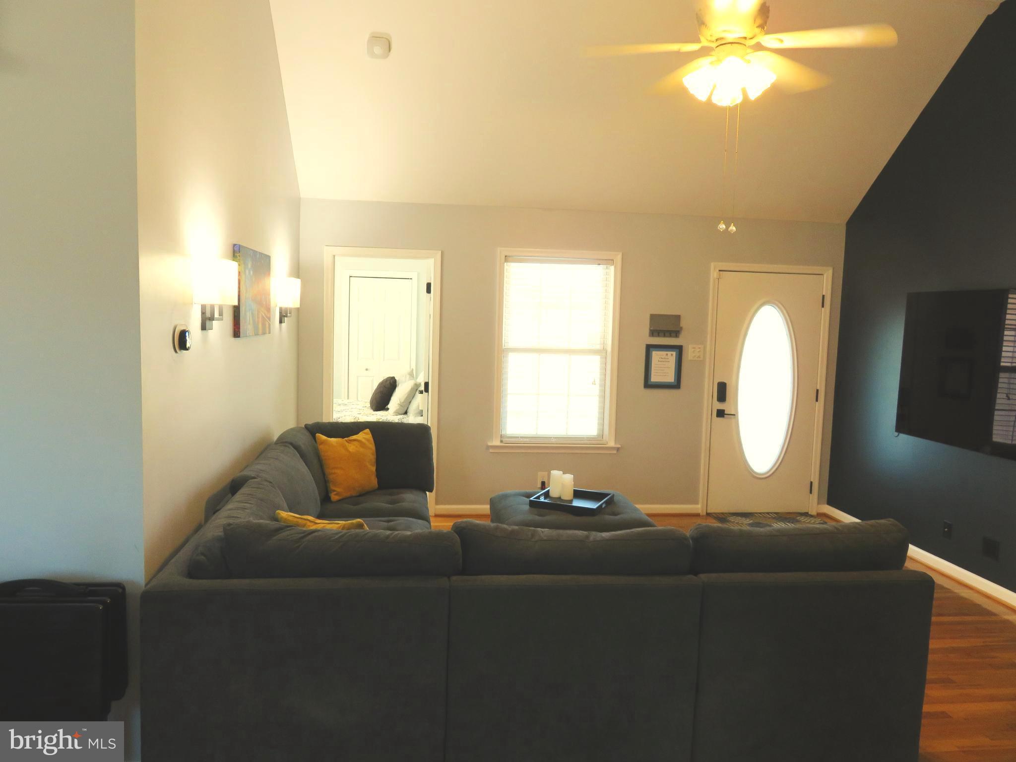 28 Bryan Drive Rehoboth Beach, DE 19971 - Photo 10 of 41 a living room with furniture and a window