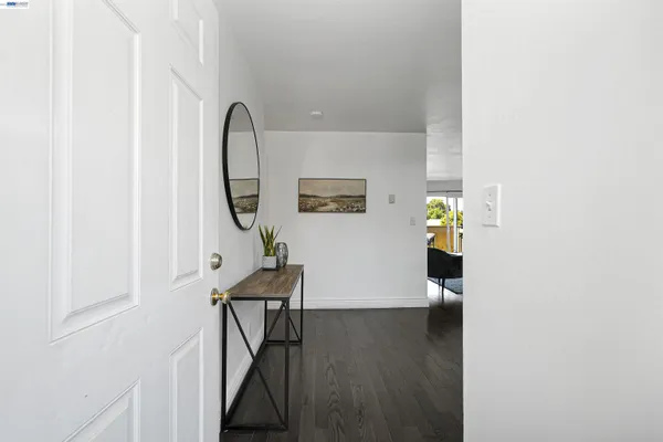 a view of a entryway with wooden floor