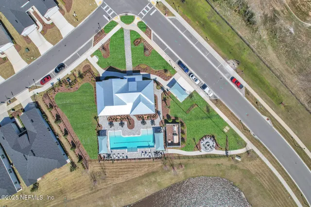 a front view of a house with a yard and porch