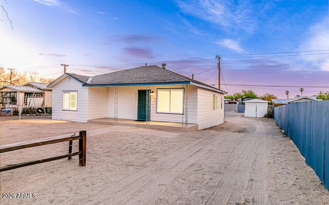 630 Solana Avenue Ajo, AZ 85321 - Photo 13 of 41 a view of a house with a patio