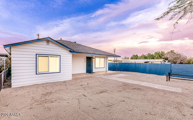 630 Solana Avenue Ajo, AZ 85321 - Photo 14 of 41 a backyard of a house with table and chairs