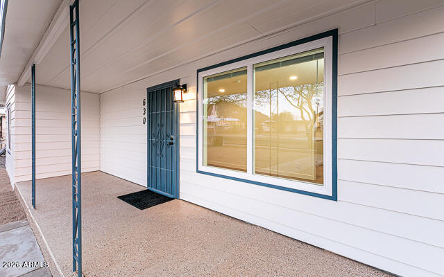 630 Solana Avenue Ajo, AZ 85321 - Photo 15 of 41 a view of an empty room with a window
