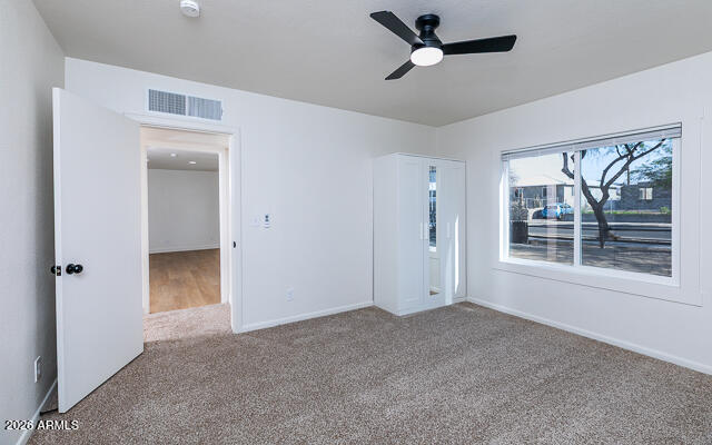 630 Solana Avenue Ajo, AZ 85321 - Photo 23 of 41 a view of an empty room with a window