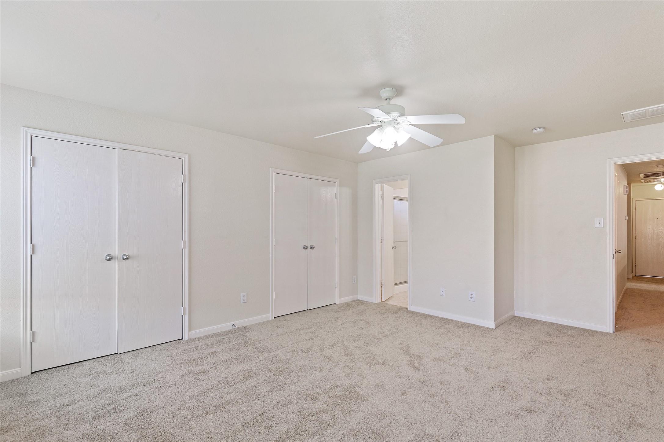 29522 Legends Stone Drive Spring, TX 77386 - Photo 11 of 17 a view of an empty room with a ceiling fan