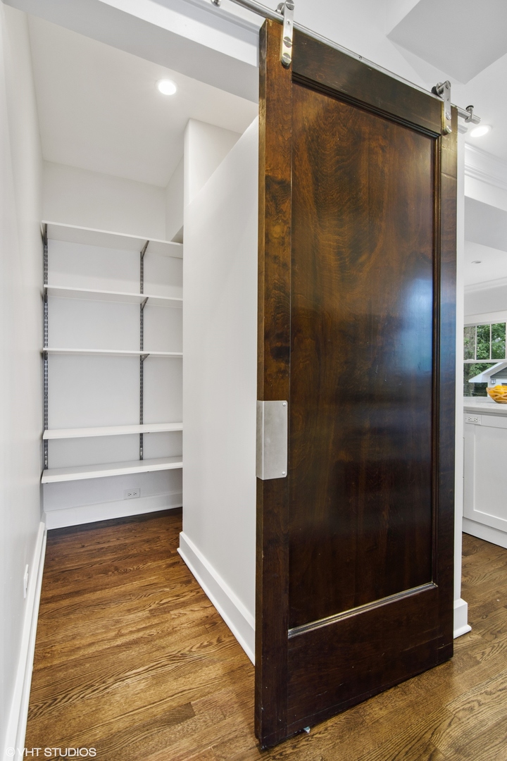 628 Abbotsford Road Kenilworth, IL 60043 - Photo 24 of 48 a bathroom with a shower and a mirror