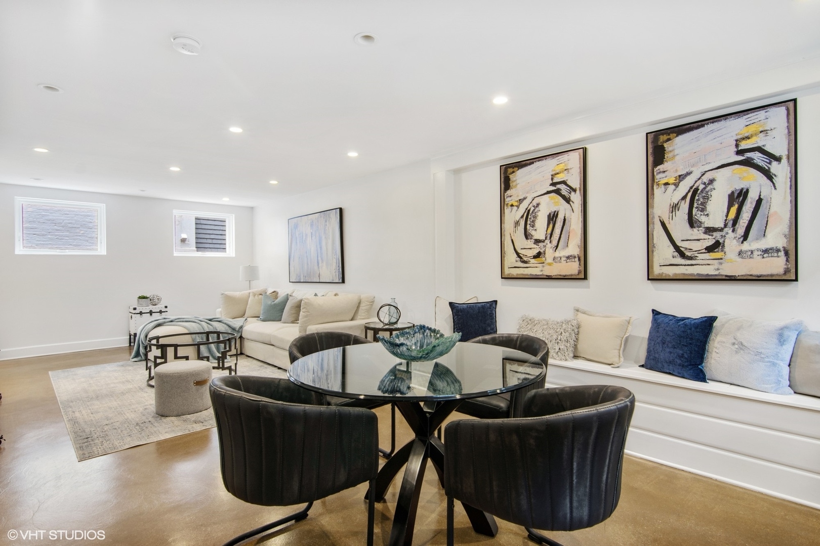 628 Abbotsford Road Kenilworth, IL 60043 - Photo 40 of 48 a living room with furniture and paintings on the wall