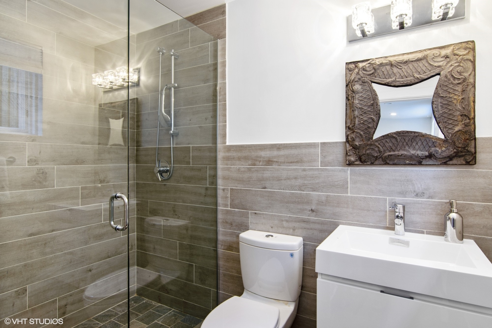 628 Abbotsford Road Kenilworth, IL 60043 - Photo 42 of 48 a bathroom with a toilet sink and shower