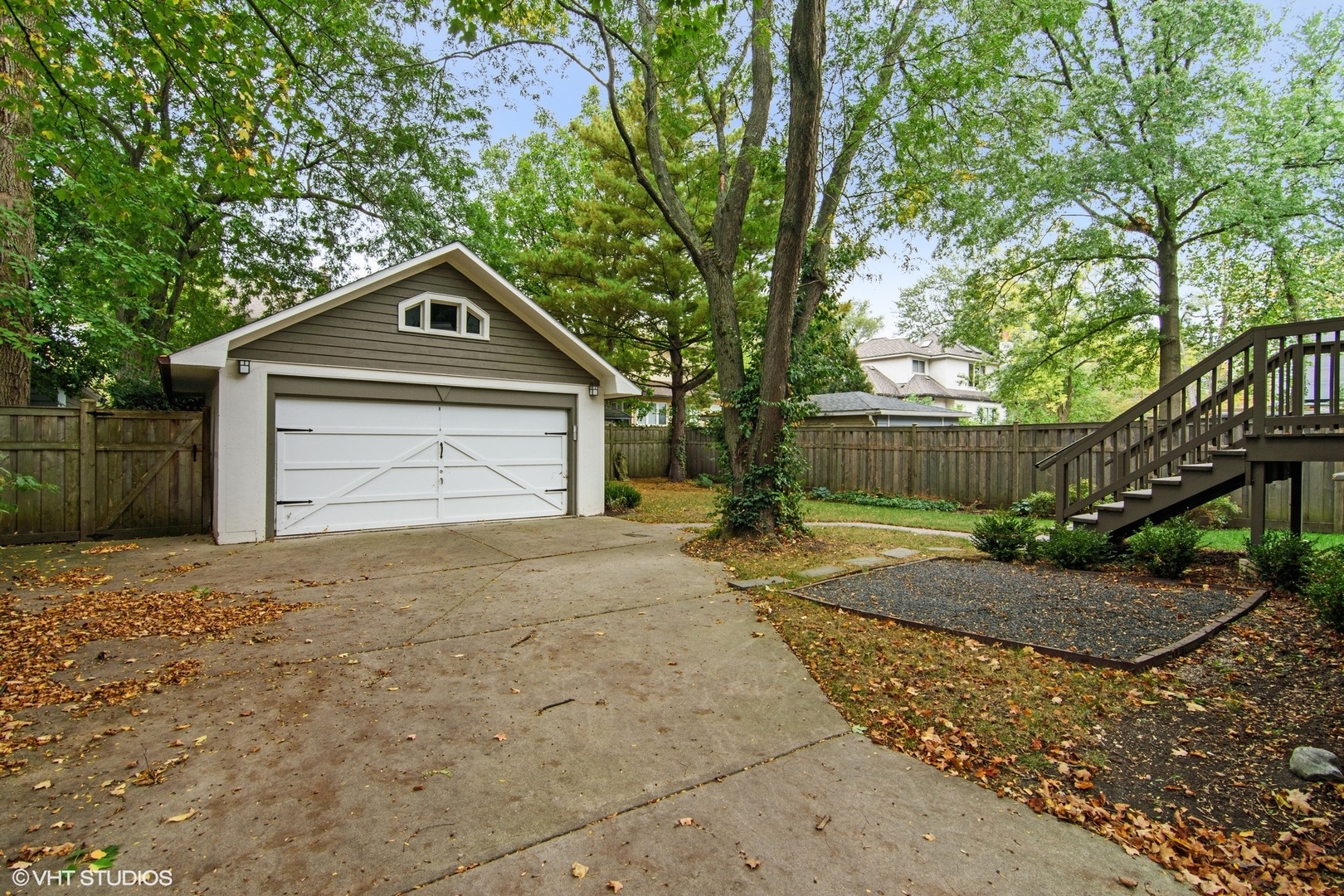 628 Abbotsford Road Kenilworth, IL 60043 - Photo 44 of 48 a front view of a house with a yard and garage