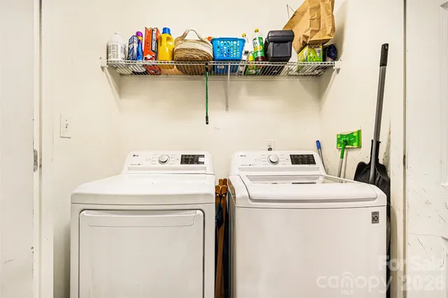 a utility room with dryer and washer
