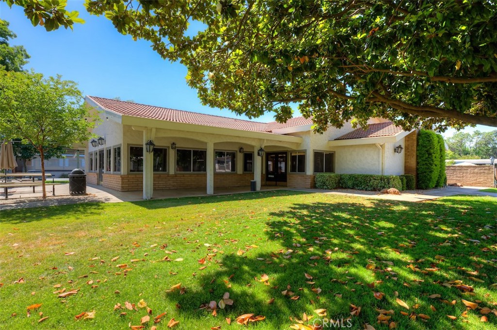1901 Dayton Road, Unit 133 Chico, CA 95928 - Photo 32 of 36 a view of a house with a backyard