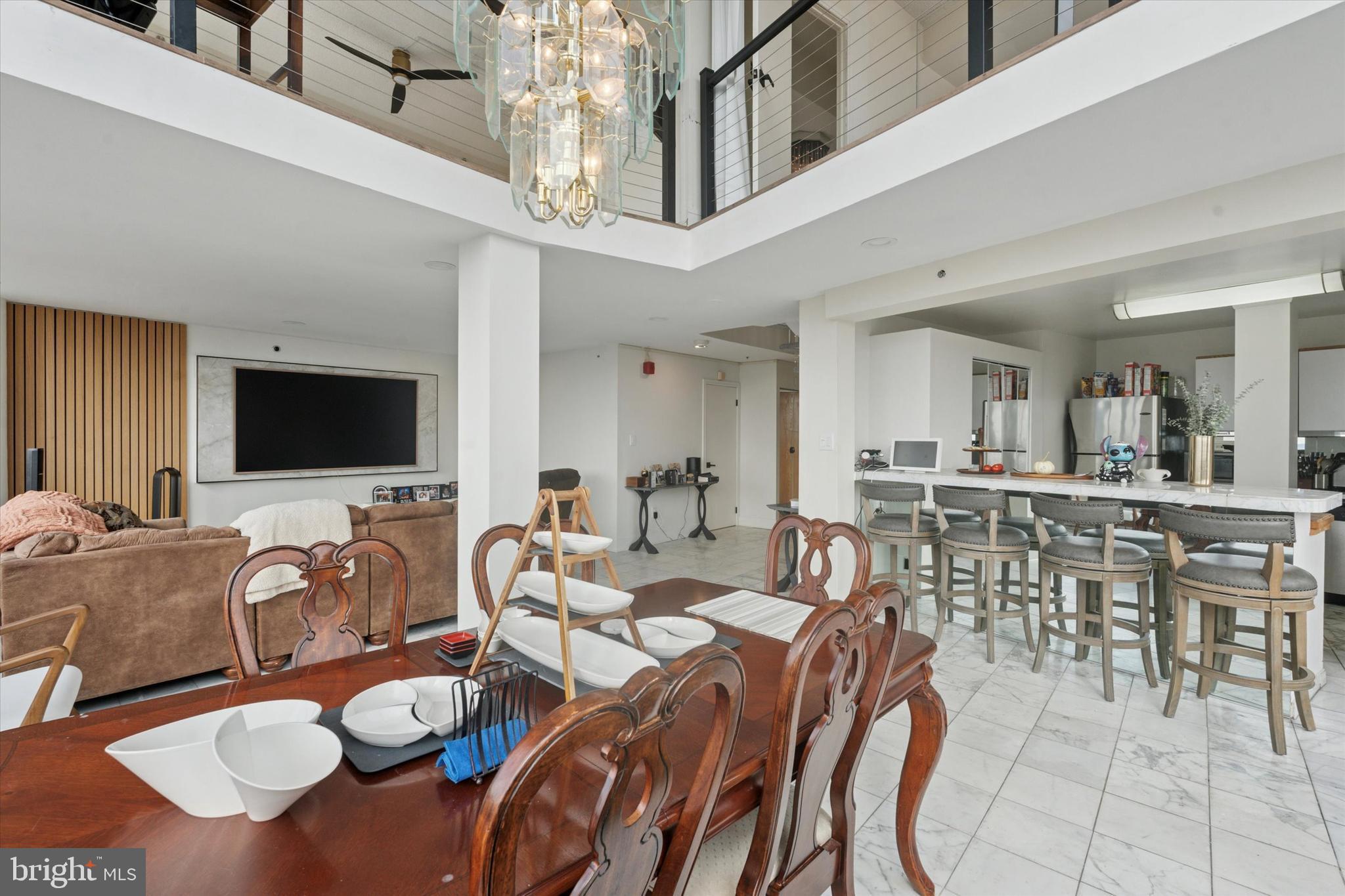 3900 West Ford Road, Unit 23B Philadelphia, PA 19131 - Photo 4 of 15 a view of a dining room with furniture