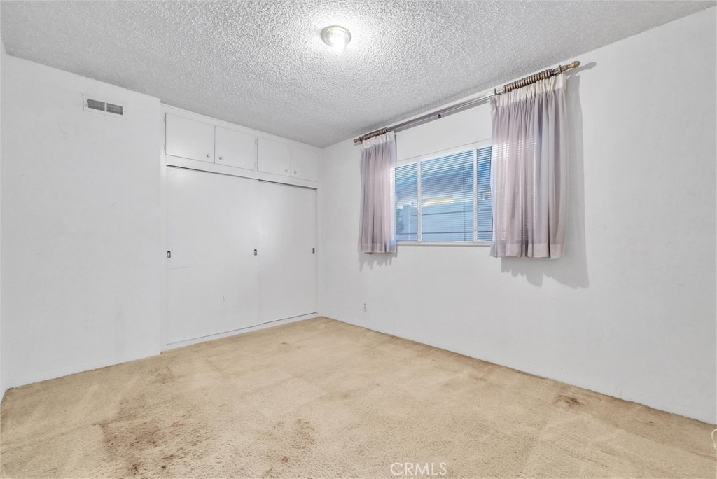 2680 Chatwin Avenue Long Beach, CA 90815 - Photo 17 of 33 a view of an empty room with a window