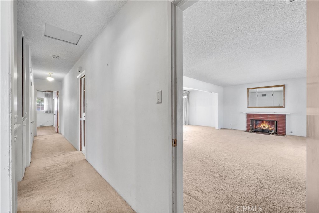 2680 Chatwin Avenue Long Beach, CA 90815 - Photo 21 of 33 a view of a room with a hallway