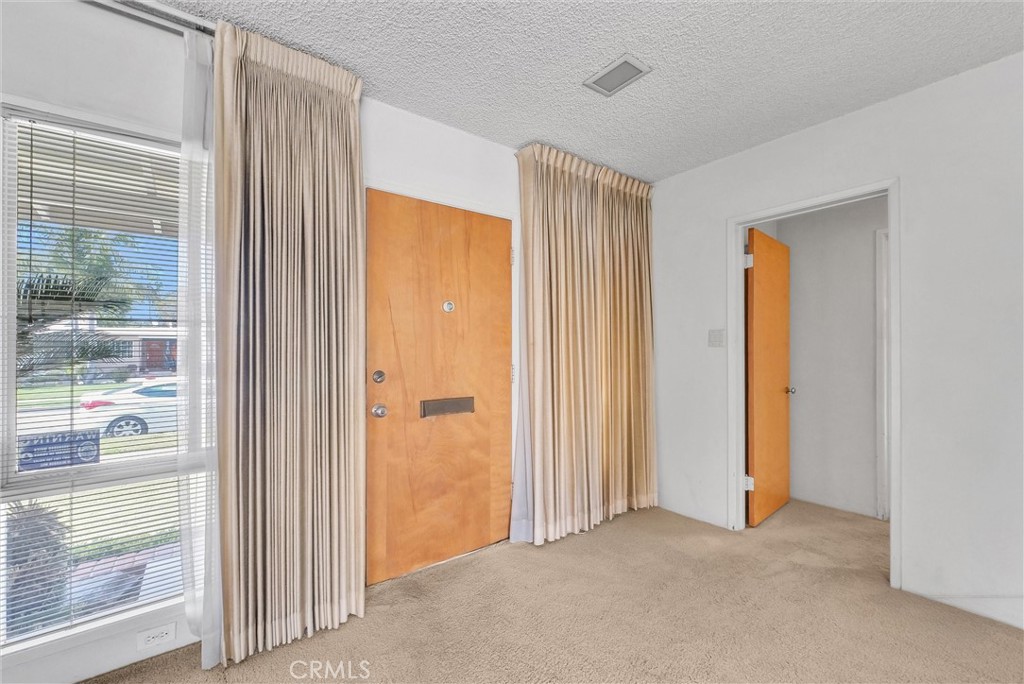 2680 Chatwin Avenue Long Beach, CA 90815 - Photo 3 of 33 a view of an empty room with a window