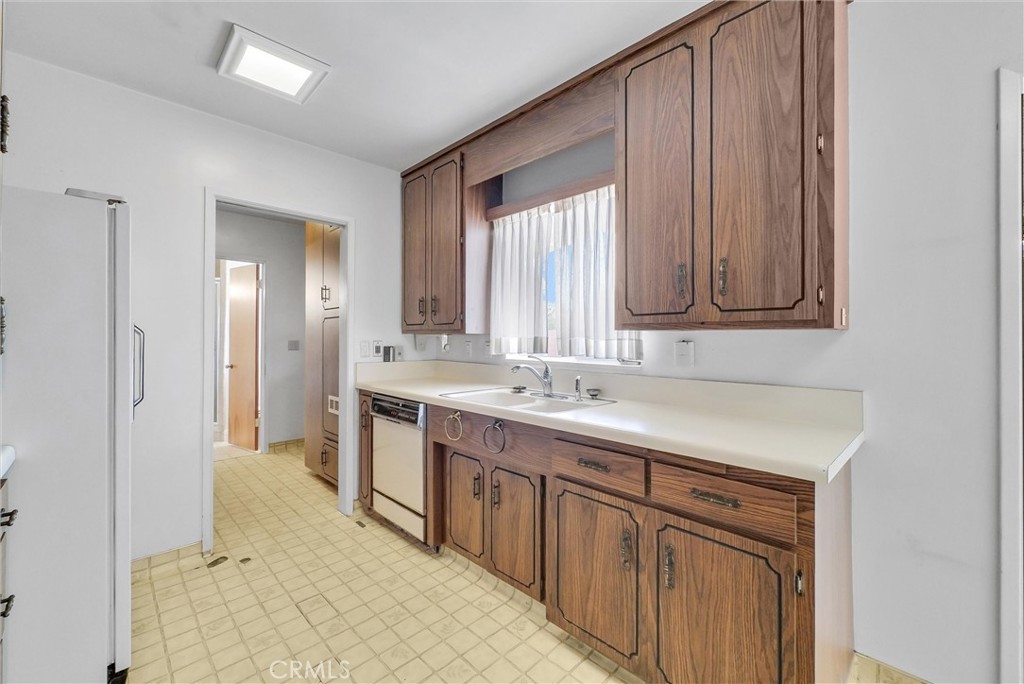 2680 Chatwin Avenue Long Beach, CA 90815 - Photo 10 of 33 a bathroom with a sink and a mirror