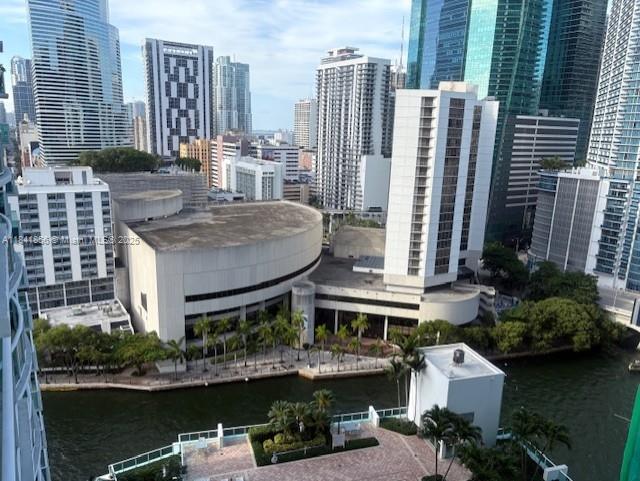a balcony with a table and chairs