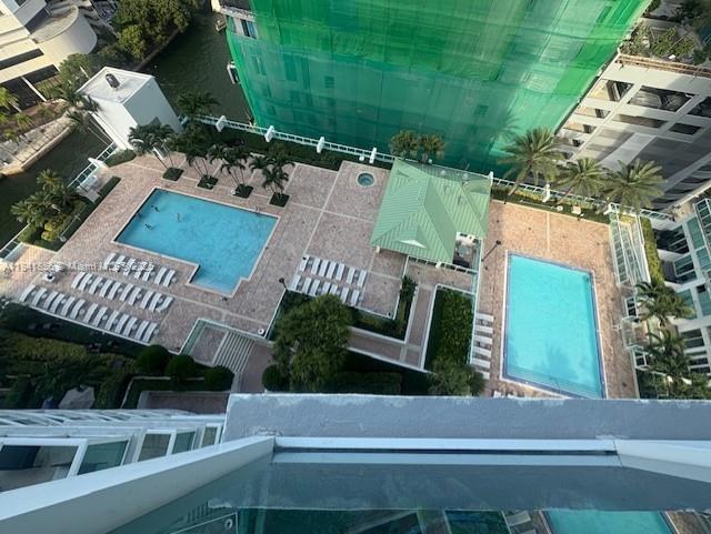 Brickell on the River Miami, FL 33131 - Photo 2 of 12 an aerial view of a house with a yard and tree s