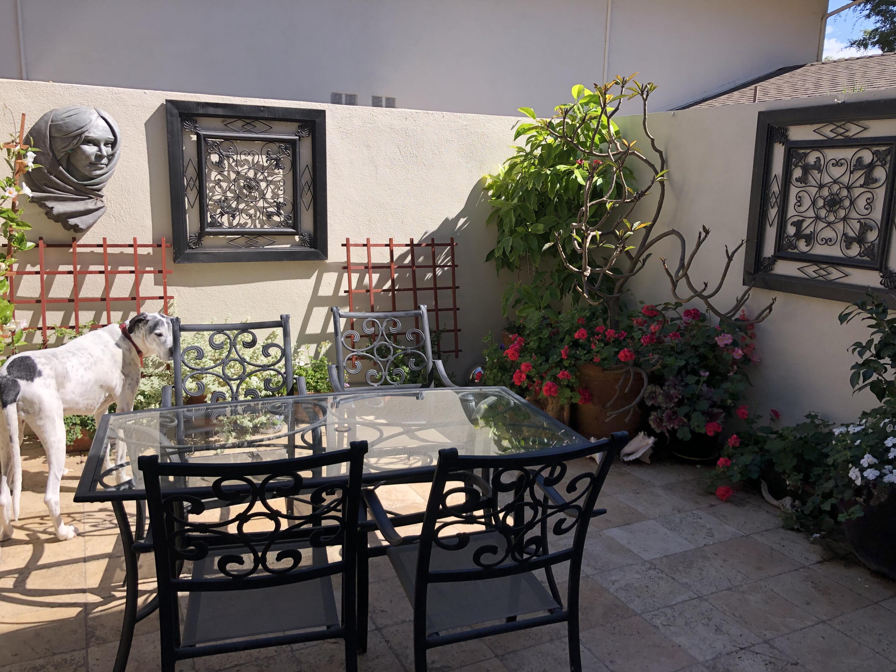 847 Cieneguitas Road Santa Barbara, CA 93110 - Photo 14 of 15 a view of a dining room with furniture and chandelier