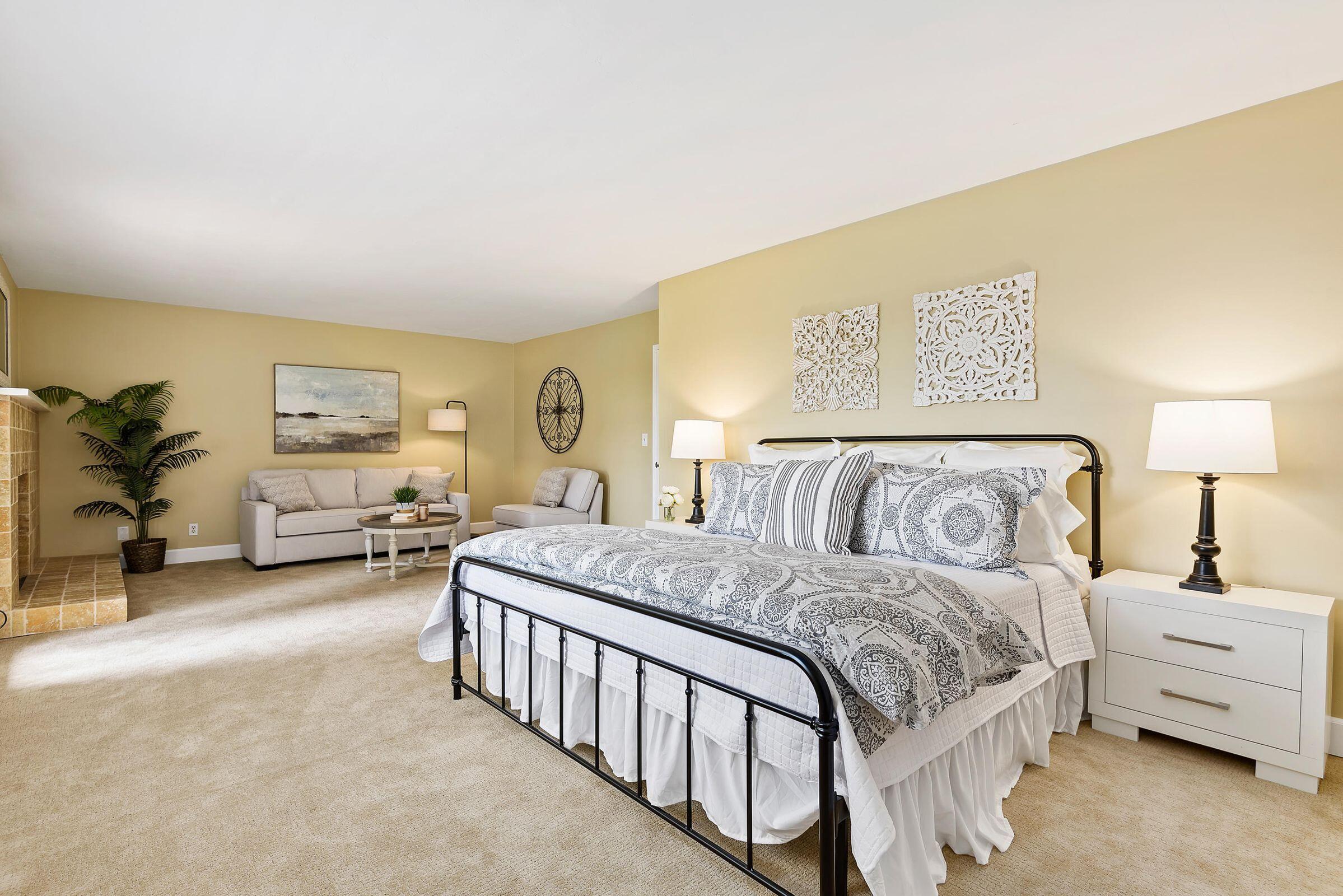 847 Cieneguitas Road Santa Barbara, CA 93110 - Photo 6 of 15 a spacious bedroom with a bed and a couch