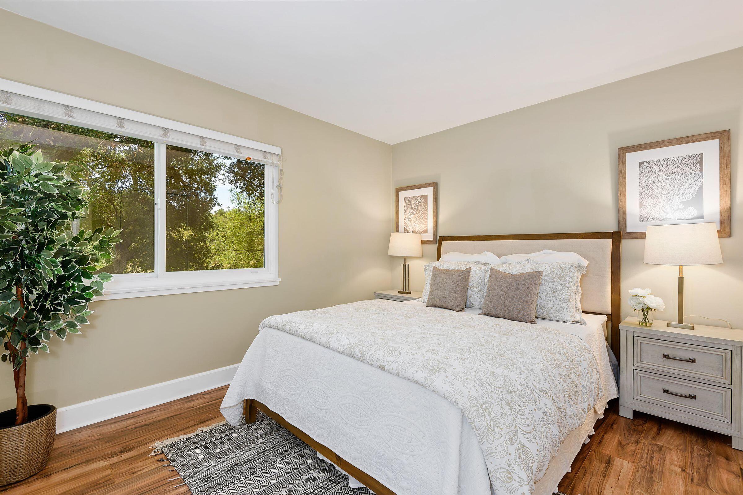 847 Cieneguitas Road Santa Barbara, CA 93110 - Photo 10 of 15 a bedroom with a bed and a window