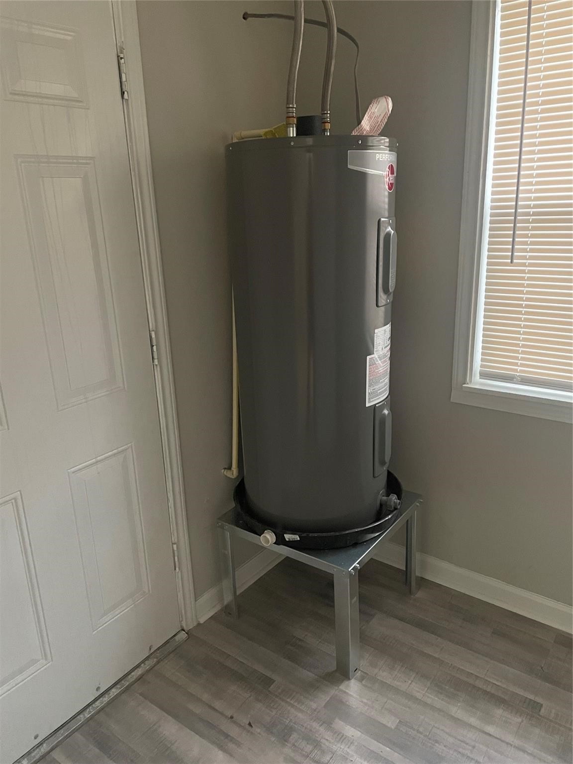 4038 Erby Street Houston, TX 77087 - Photo 10 of 19 a view of a room with wooden floor and windows
