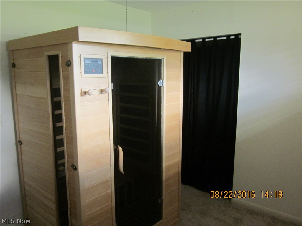 638 Substation Road Brunswick, OH 44212 - Photo 14 of 16 BR3 is currently being used as a workout room with sauna, but that sauna doesn't stay.