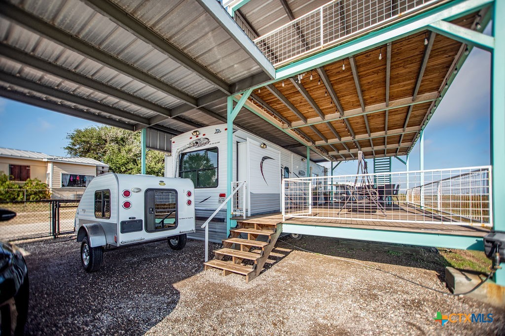 305 Zimmerman Road Port Lavaca, TX 77979 - Photo 14 of 33 a backyard of a house with barbeque oven table and chairs