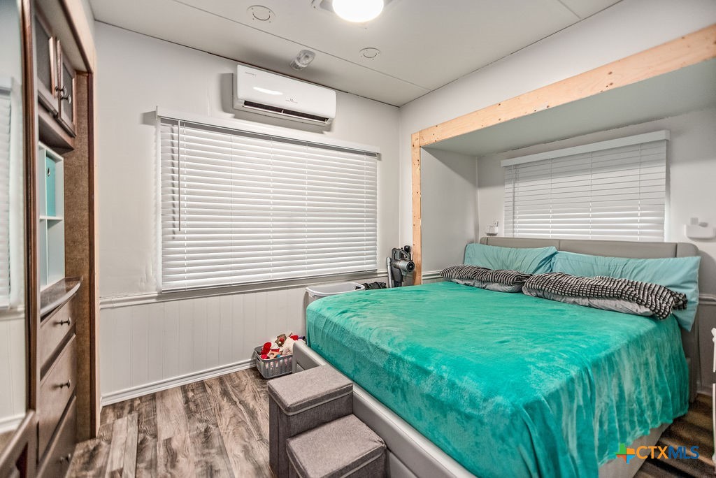 305 Zimmerman Road Port Lavaca, TX 77979 - Photo 24 of 33 a bedroom with a bed and a window
