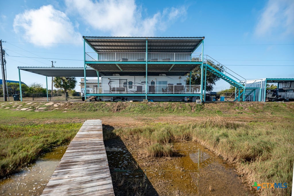 305 Zimmerman Road Port Lavaca, TX 77979 - Photo 4 of 33 a view of a swimming pool with a patio