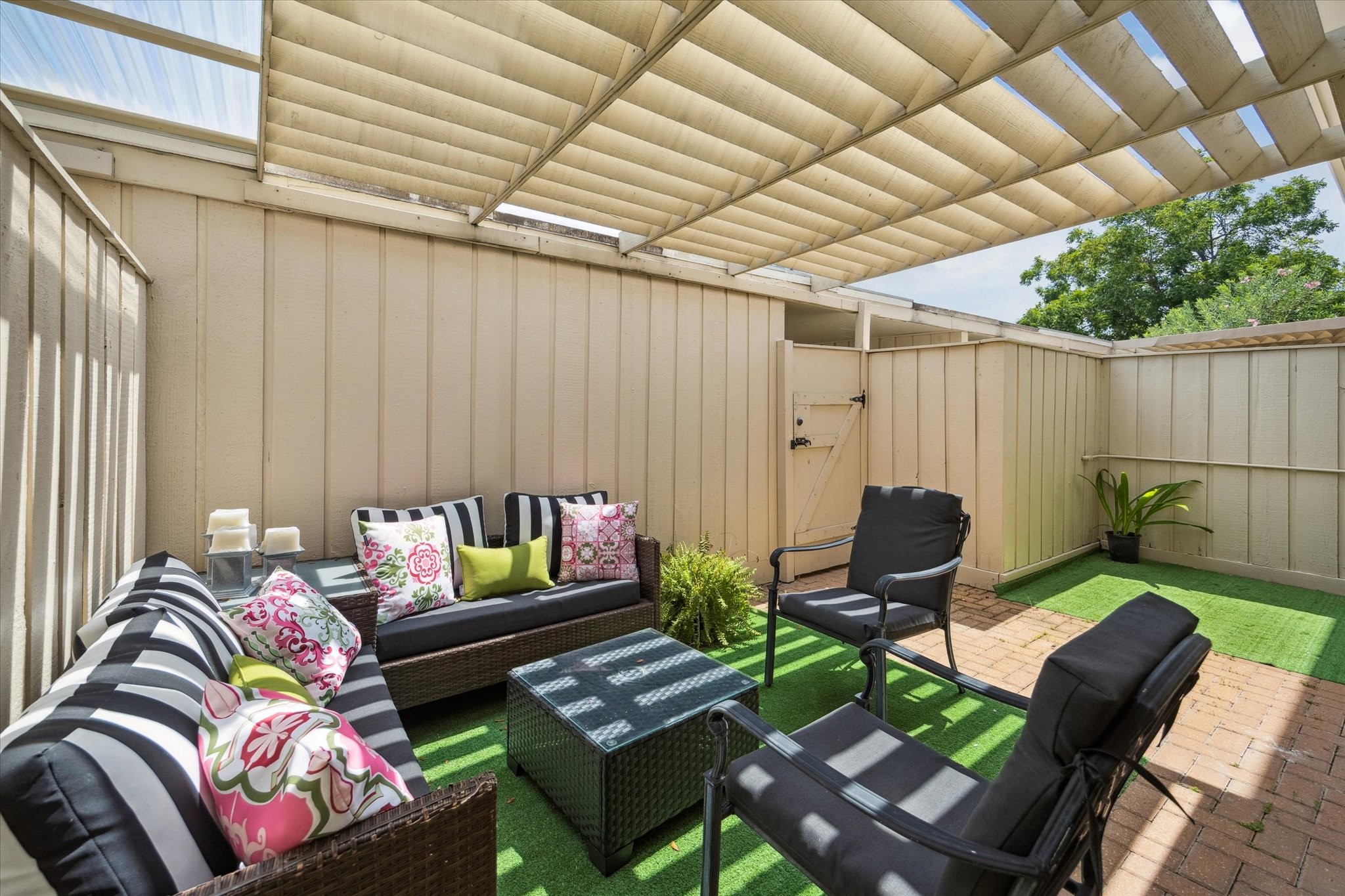 5842 Doliver Drive, Unit 47 Houston, TX 77057 - Photo 17 of 24 Enjoy the outdoors on your private patio with sun trellis. What a GREAT entertaining spot!