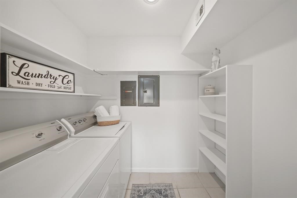 5842 Doliver Drive, Unit 47 Houston, TX 77057 - Photo 7 of 24 You'll love the large utility room right off the kitchen featuring built-in shelving for lots of storage.