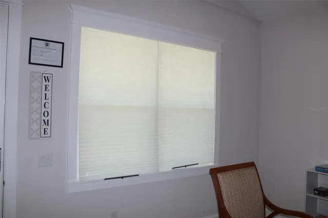 a view of a hallway with closet