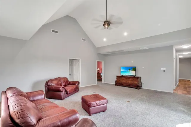 a bedroom with furniture and a couch