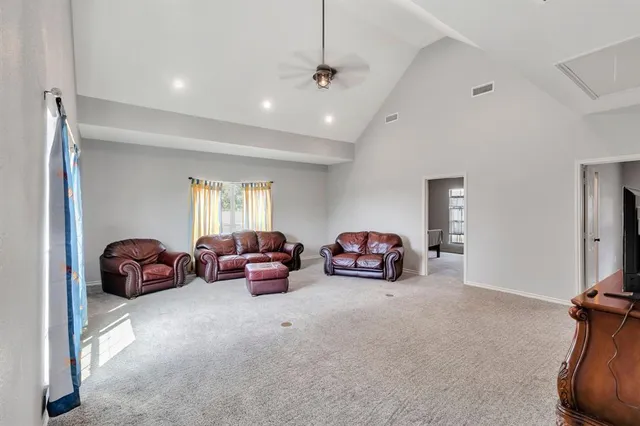 a view of a livingroom with furniture and a couch