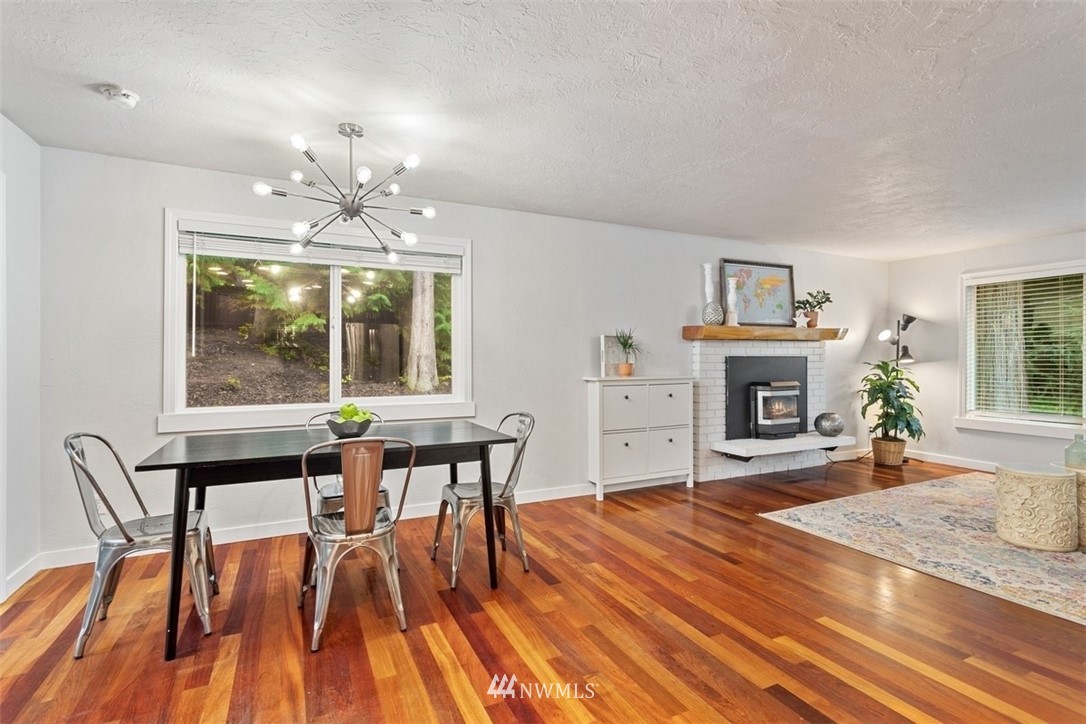 5680 Northeast Foster Road Bainbridge Island, WA 98110 - Photo 6 of 23 a view of a livingroom with furniture window and wooden floor