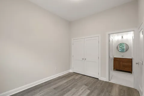 a view of a livingroom and wooden floor