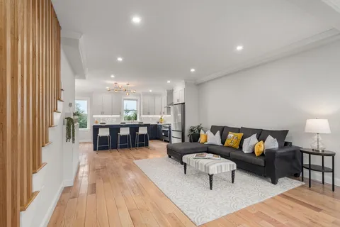 a living room with furniture and a couch