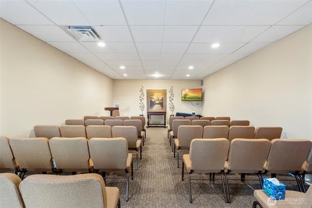 a living room with furniture and a table