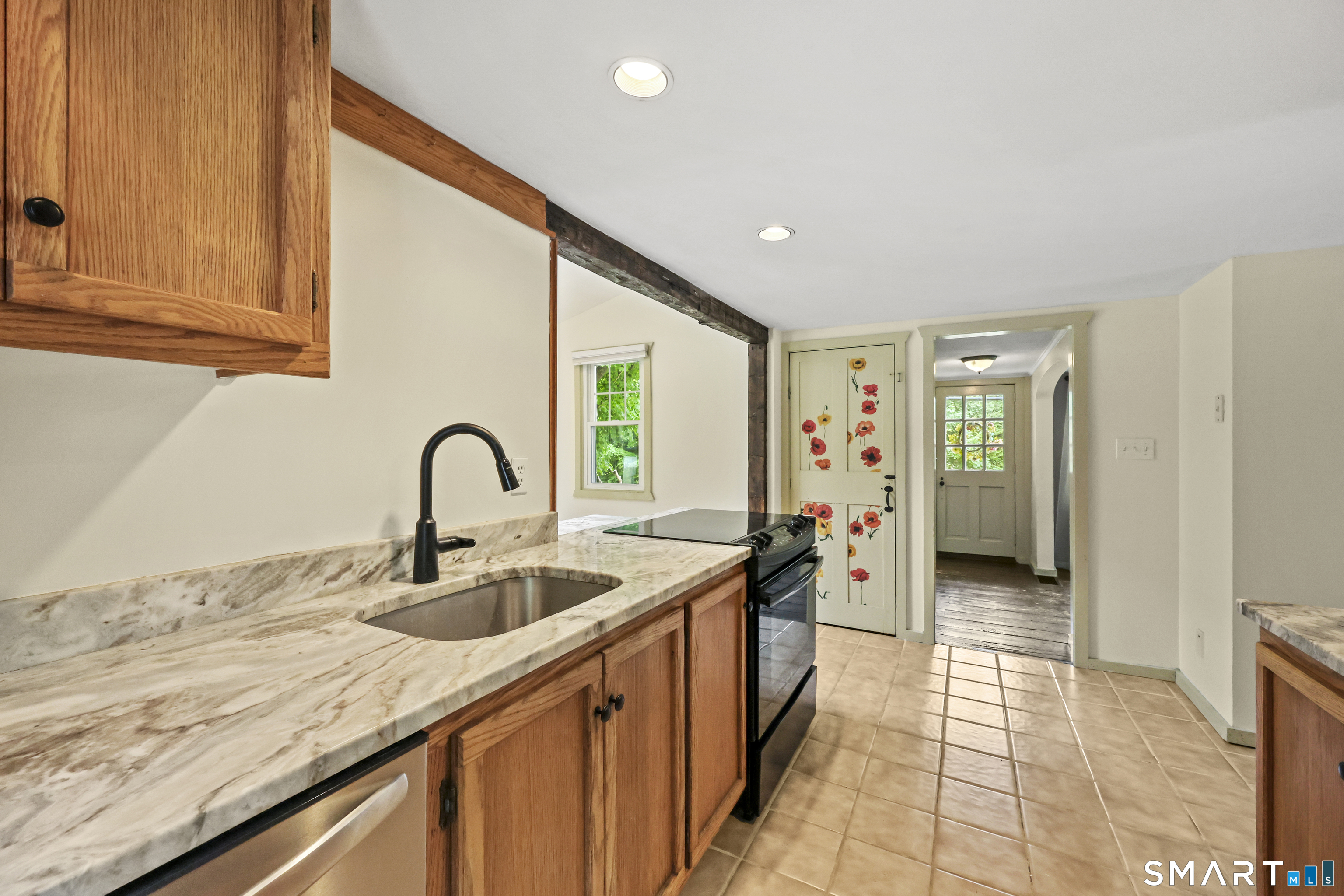 917 Hopewell Road Glastonbury, CT 06033 - Photo 6 of 39 a kitchen with a sink and cabinets