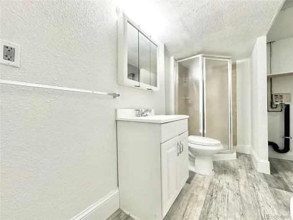 a view of a balcony with wooden floor