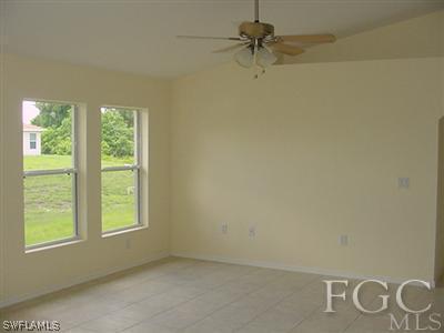 3111 35th Street Southwest Lehigh Acres, FL 33976 - Photo 5 of 10 a view of a window in a room