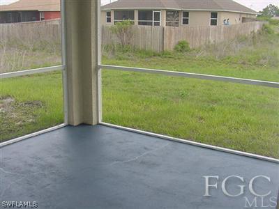 3111 35th Street Southwest Lehigh Acres, FL 33976 - Photo 10 of 10 a view of outdoor space and yard