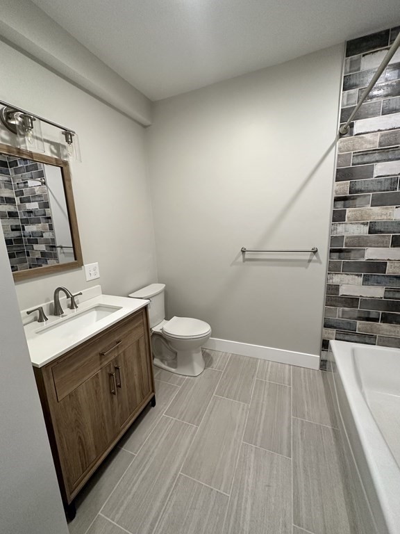 15 Tuttle Street, Unit 2 Revere, MA 02151 - Photo 10 of 17 a view of a bathroom with a sink and mirror