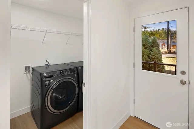 a utility room with dryer and washer